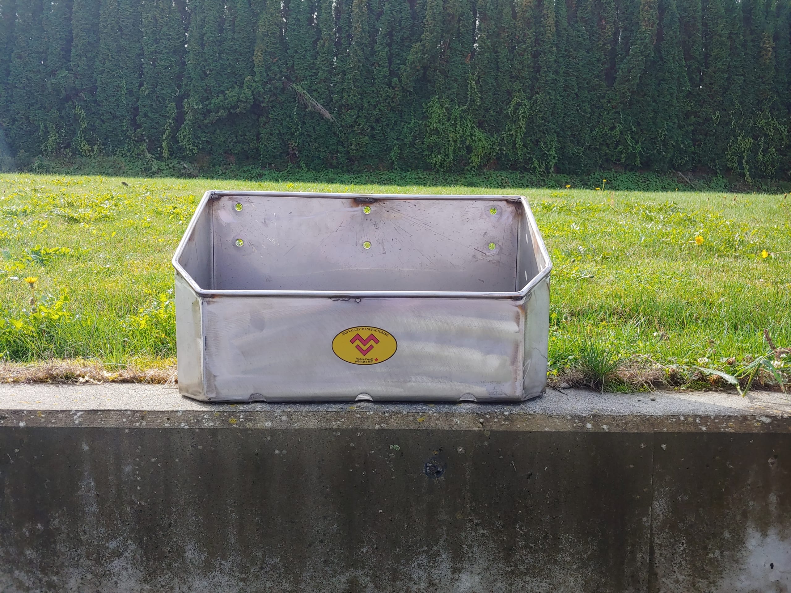 Galvanized mineral block holder front view