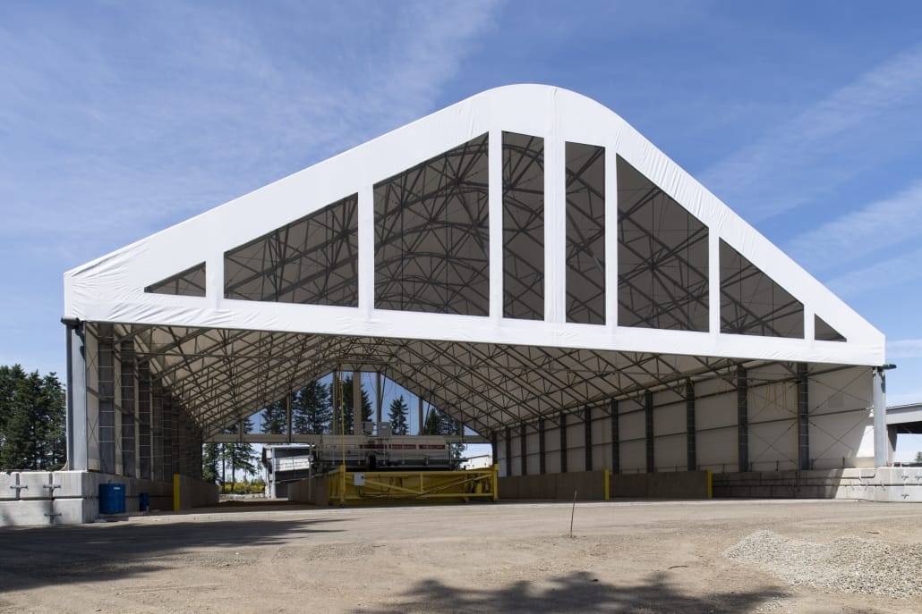 Compost turner equipment under a large tarped building